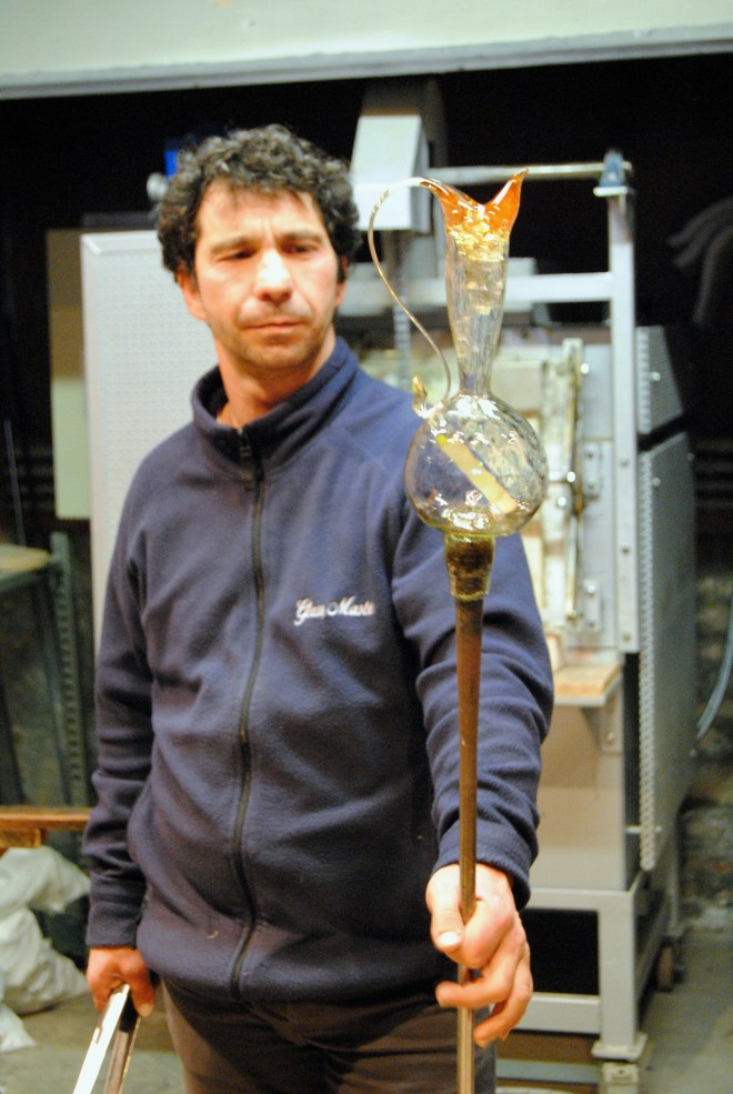 The maestro and the vase he made at the glass blowing demonstration.