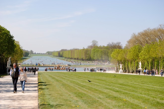View of the gardens from the pathway leading up to Versailles.